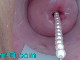Cervix knull spelar införings en japanska vibratorn.