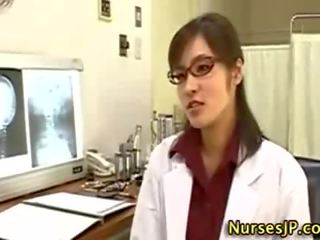 Azjatyckie kobieta doktor na ręcznym